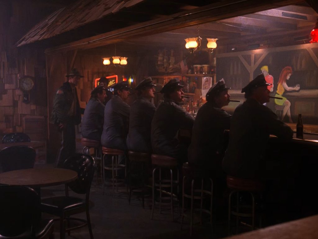 Maytag Men sitting at a bar