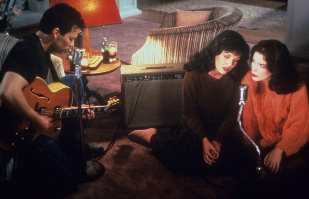 James Hurley, Maddy Ferguson and Donna Hayward singing