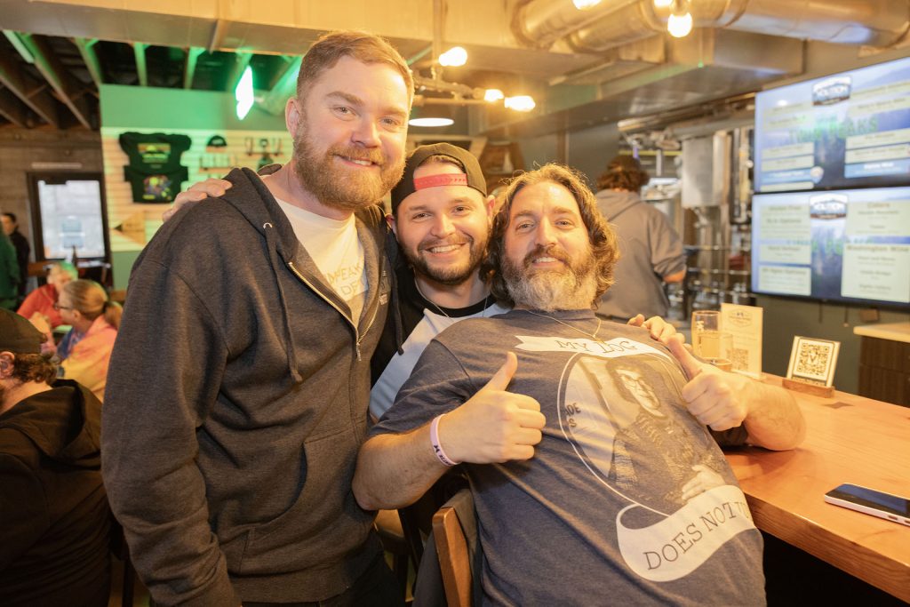 Friends gathered in Volition Brewing Co.