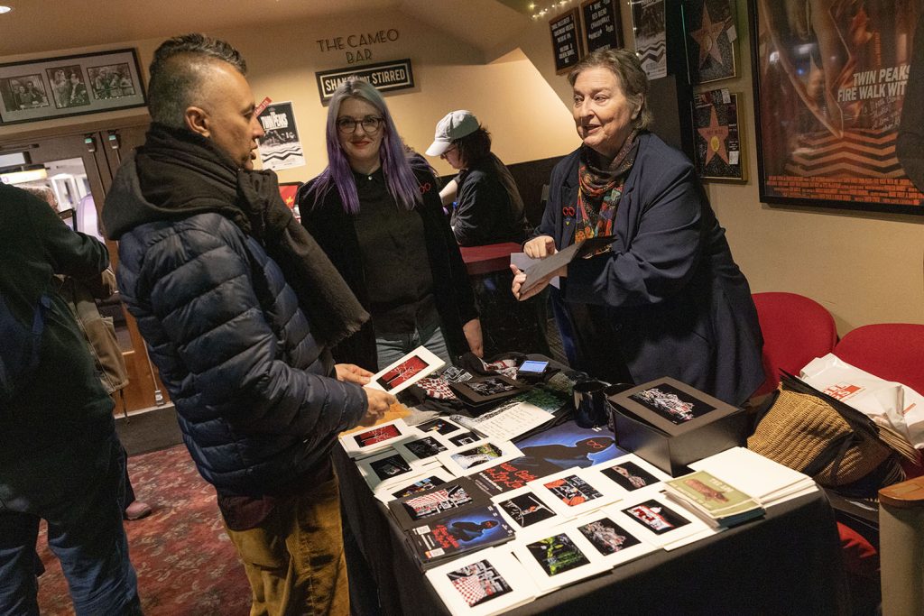 Merchandise table in lobby of theatre