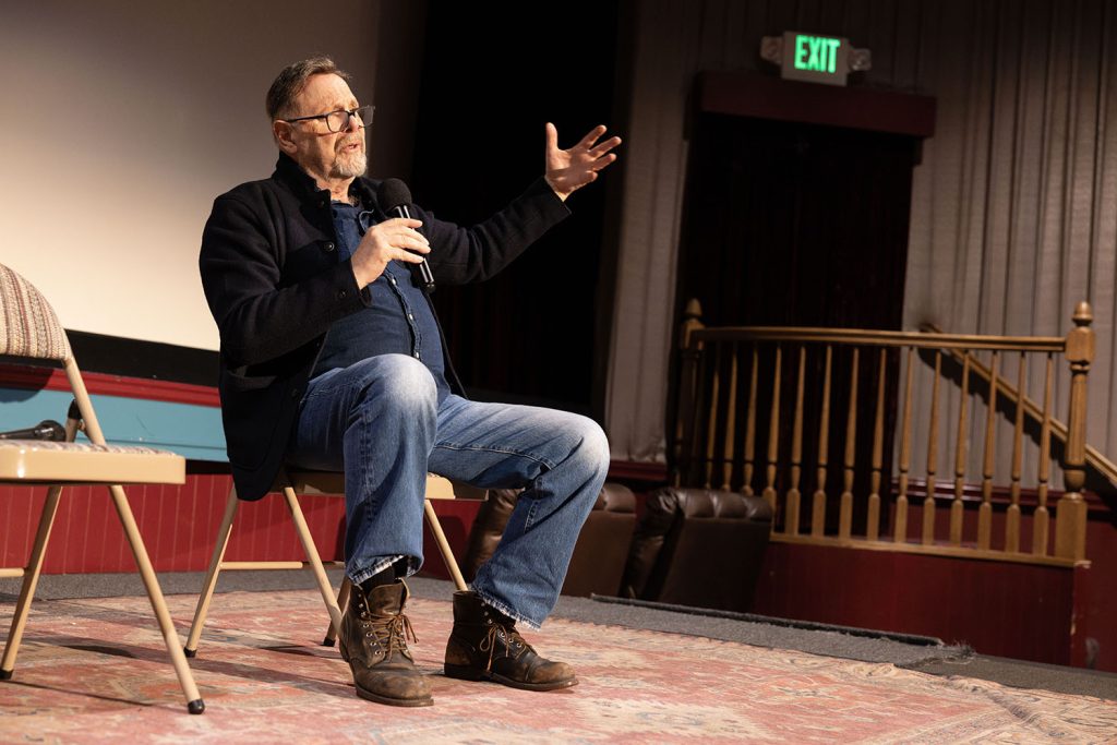 Richard Green on stage speaking