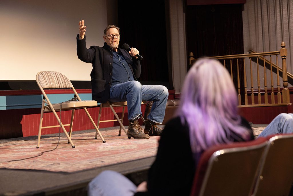 Richard Green on stage speaking