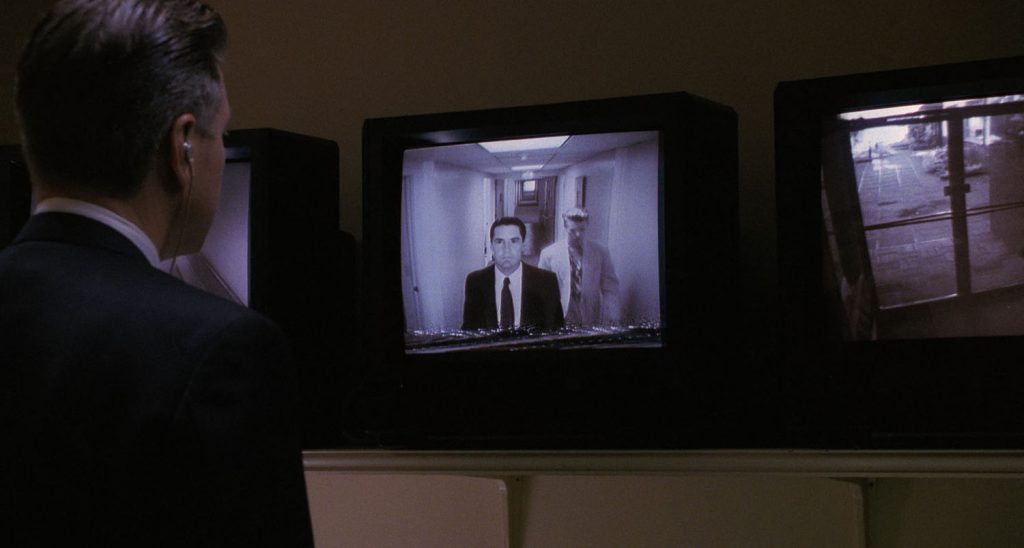 Gordon Cole looking at monitor