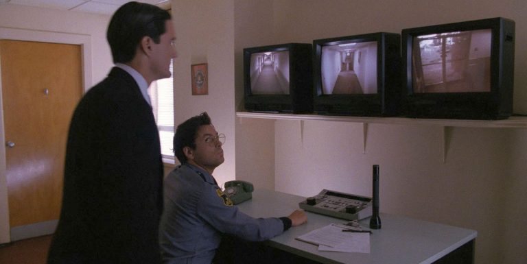 Guard looking at screens