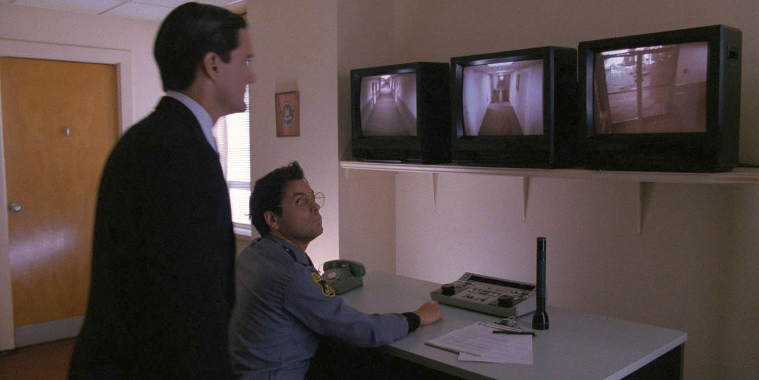 Guard looking at screens