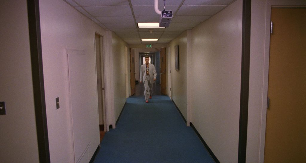 Phillip Jeffries walking down the hall