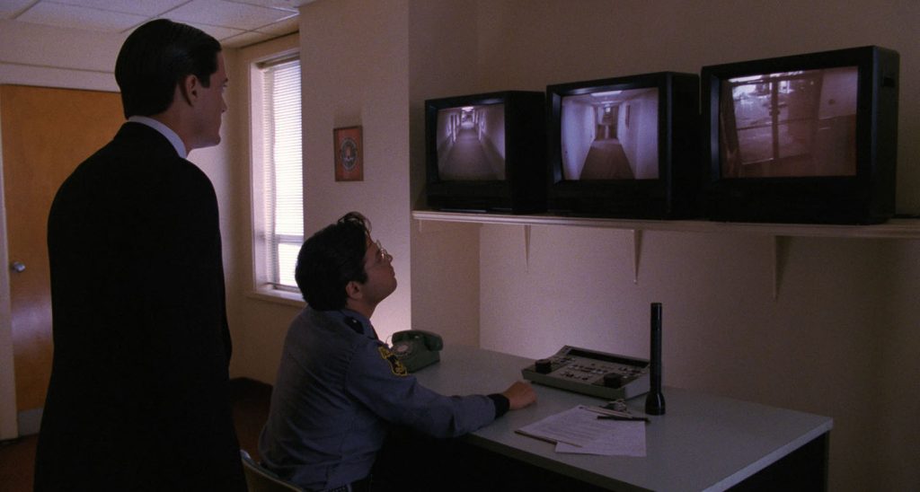 Guard looking at screens