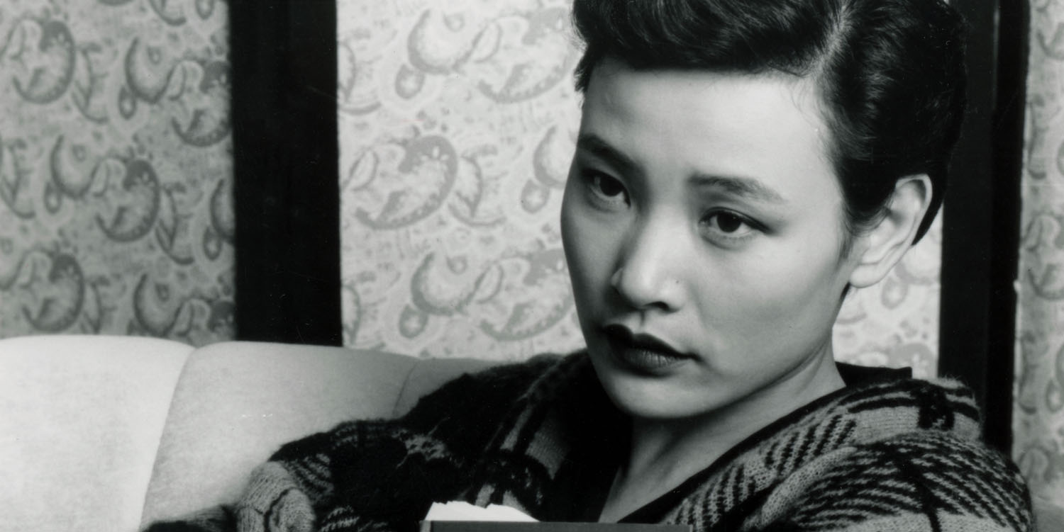 Joan Chen as Josie Packard sitting on a couch