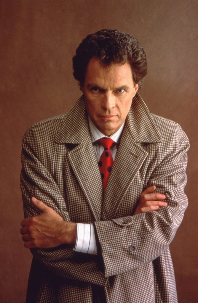 Benjamin Horne wearing an overcoat