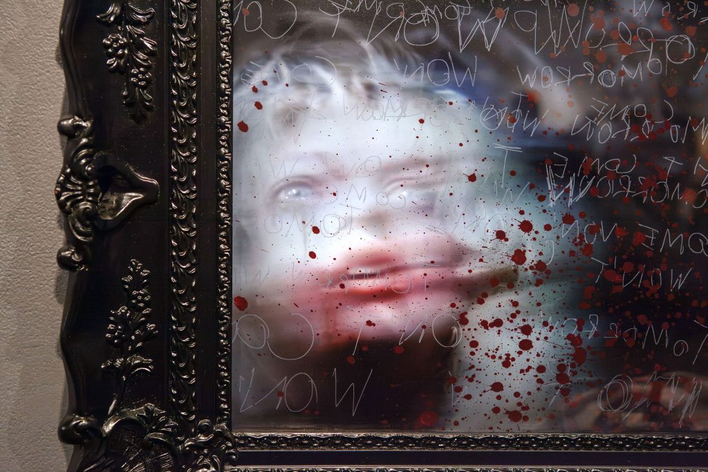 Close up image of Laura Palmer in Lori Earley's framed artwork titled, "Deliverance."