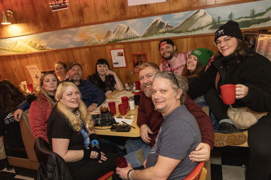 Group of people enjoying food at Twede's Cafe