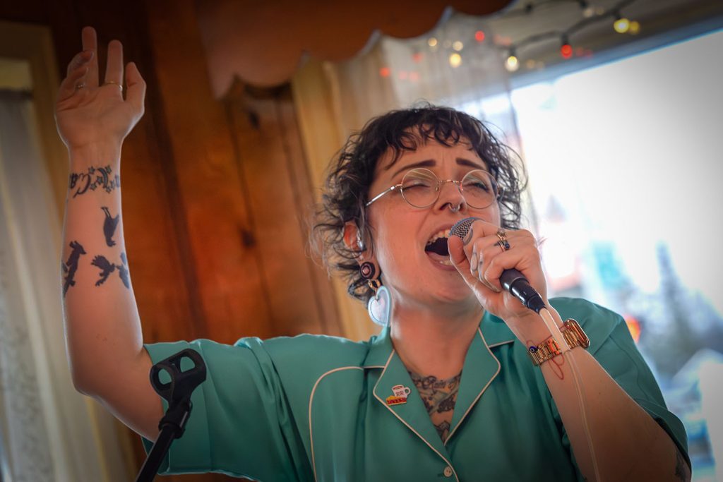 Lady K from Wisteria Lodge singing at Twede's Cafe in North Bend, Washington