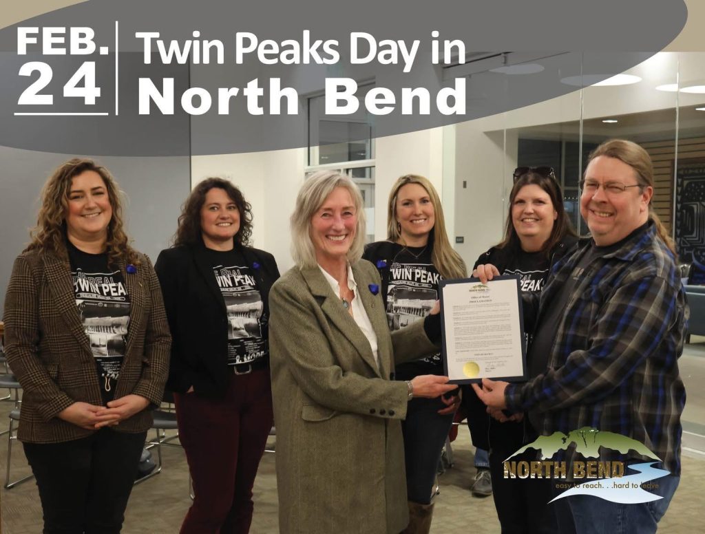 Karl Reinsch (right side of photo), was present to accept the Proclamation, alongside Kathryn Podschwit; Real Twin Peaks board member Britni Larson, North Bend Downtown Foundation Executive Director, Jessica Self; and The Real Twin Peaks board member and Historic Downtown Snoqualmie Association President, Dori Ross.