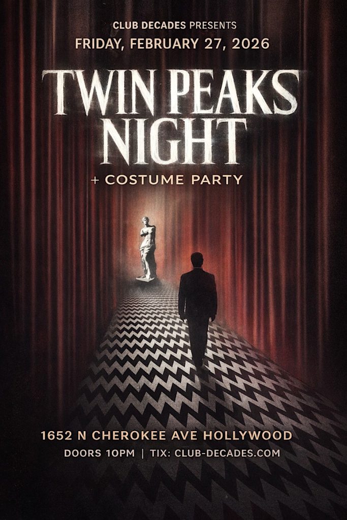 Image of Cooper walking down hall of Red Room