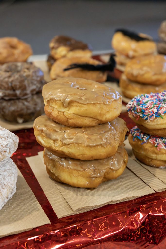 Doughnuts stacked on a table