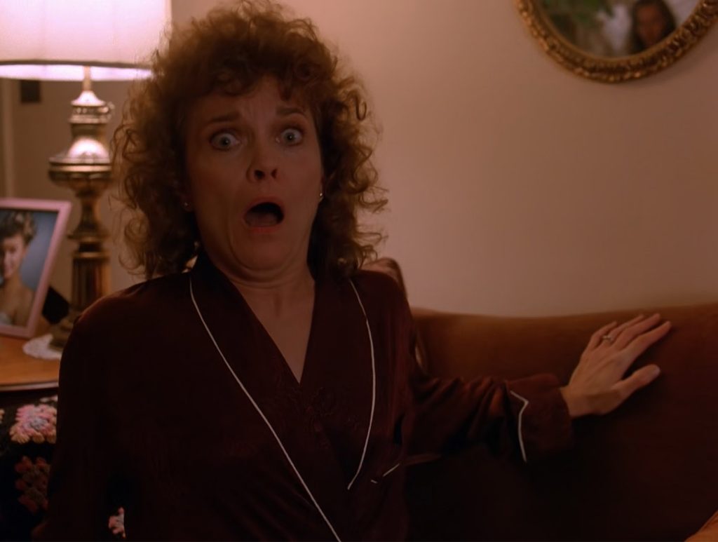 Sarah Palmer sitting up screaming in her house