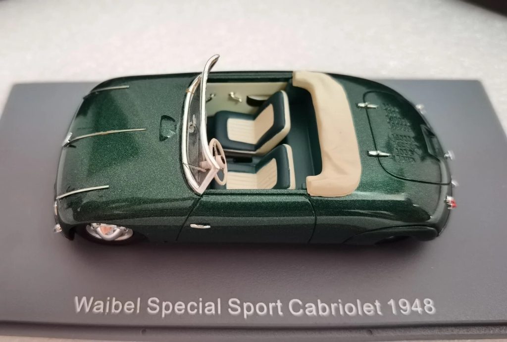 Neo Model toy car on display stand