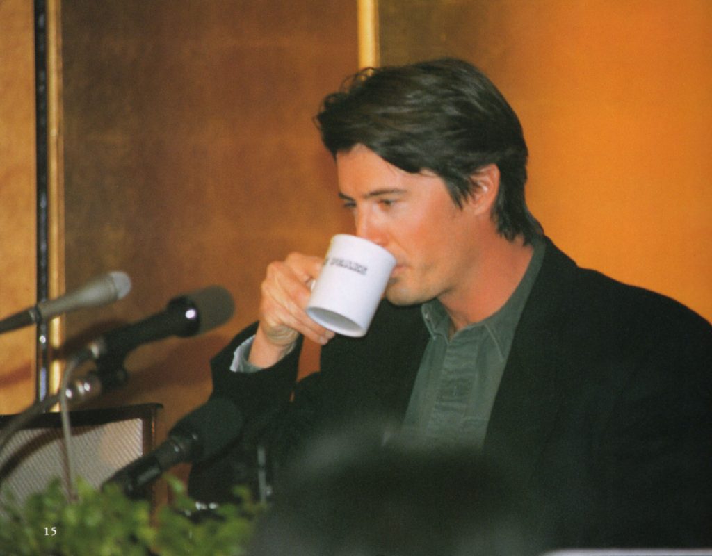 Kyle MacLachlan drinking coffee