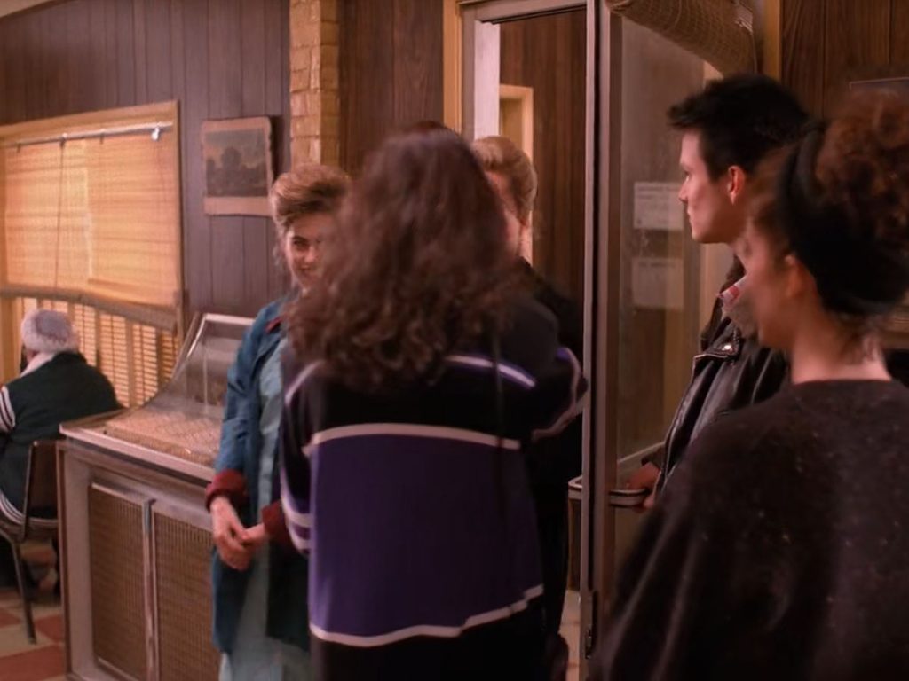 People entering and leaving the Double R Diner