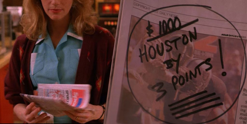 Norma Jennings holding newspaper