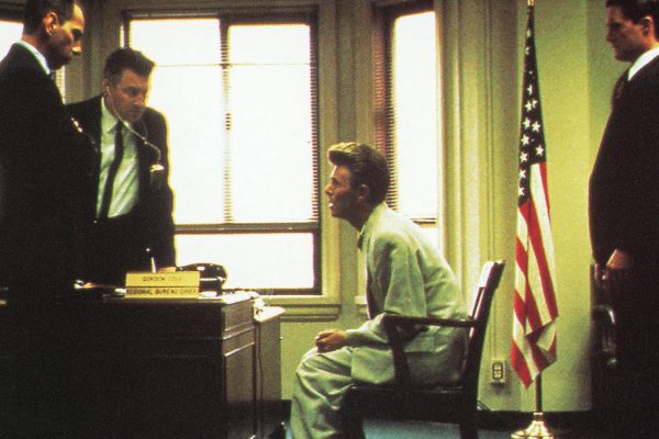 Agent Phillip Jeffries speaks to Gordon Cole, Dale Cooper and Albert Rosenfield