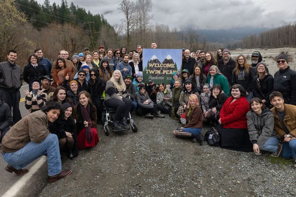 Group of Twin Peaks Fans by the Welcome to Twin Peaks sign