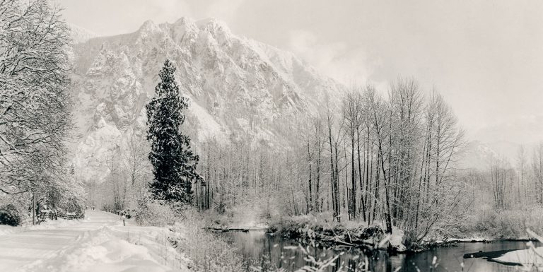 Snow covered Mount Si and Reinig Road photograph by Darius Kinsey