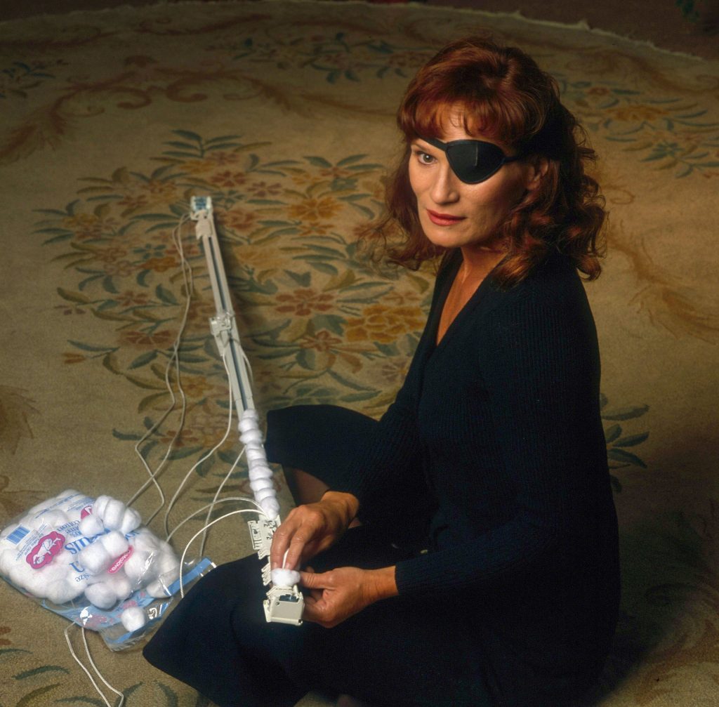 Nadine Hurley (Wendy Robie) with drape runner