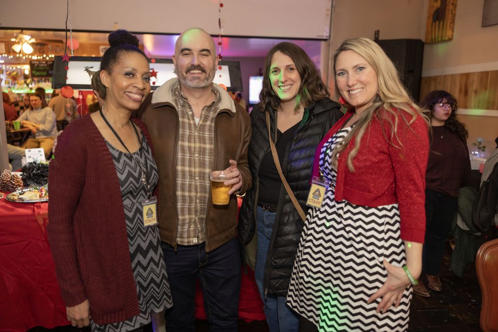 people standing in a bar