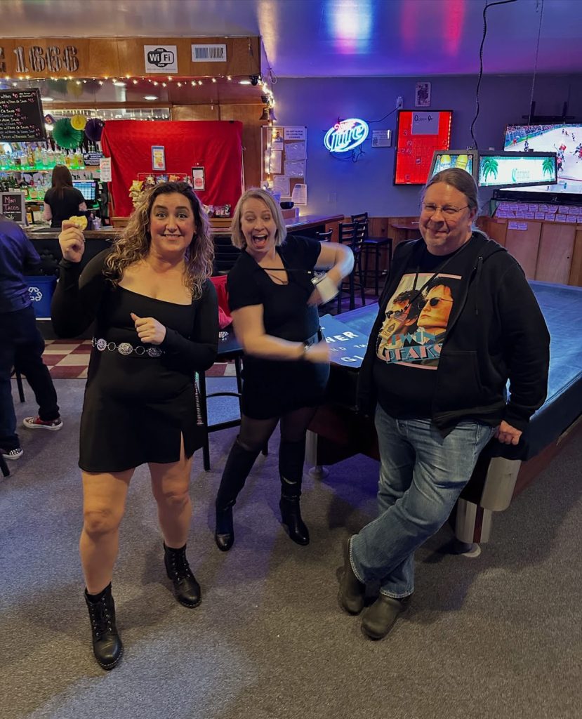 People standing in a bar