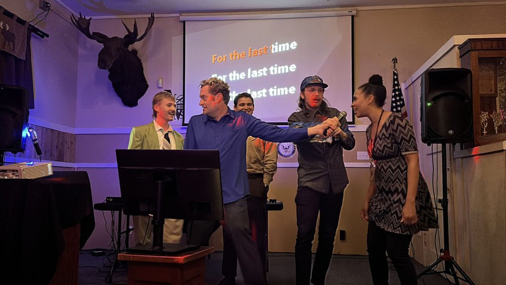 Group of people singing Shadow