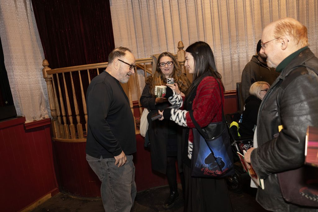 Harley Peyton receiving a mug