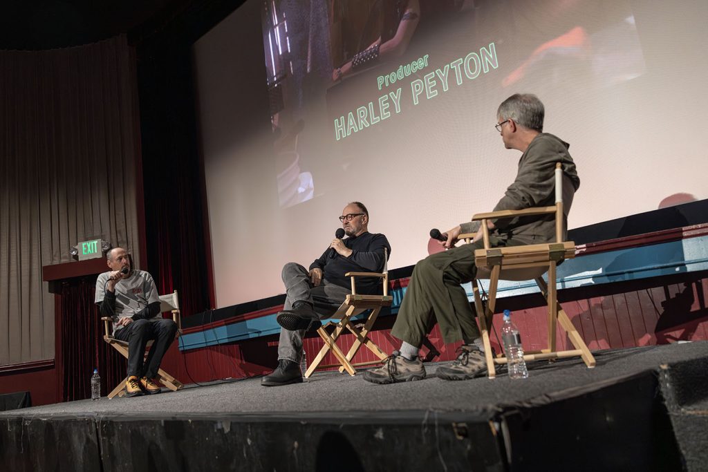 Scott Ryan, Harley Peyton and John Thorne on stage