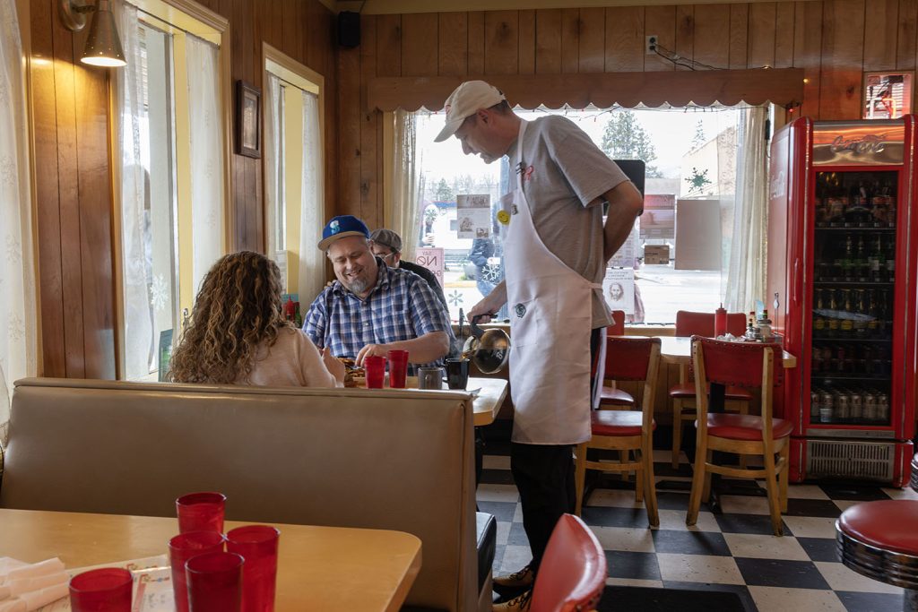 Scott Ryan pouring coffee at Twede's Cafe
