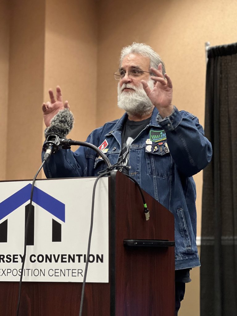 Jeff Goodwin speaking at podium