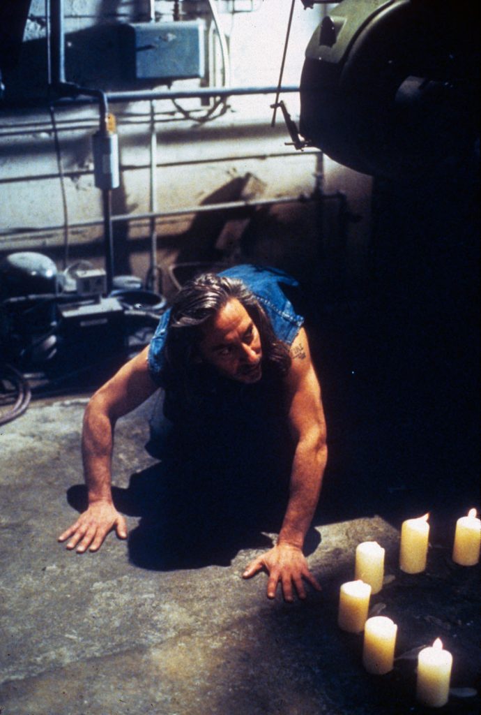 Bob (Frank Silva) on the ground of a boiler room