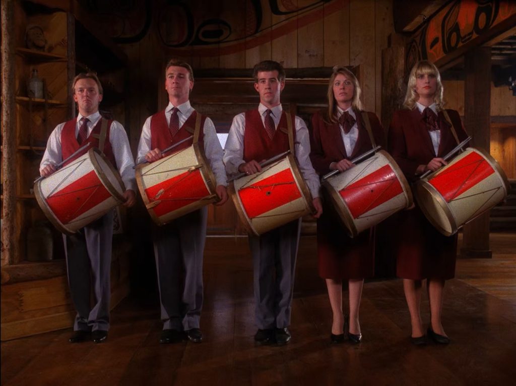 Great Northern Hotel employees holding vintage snare drums