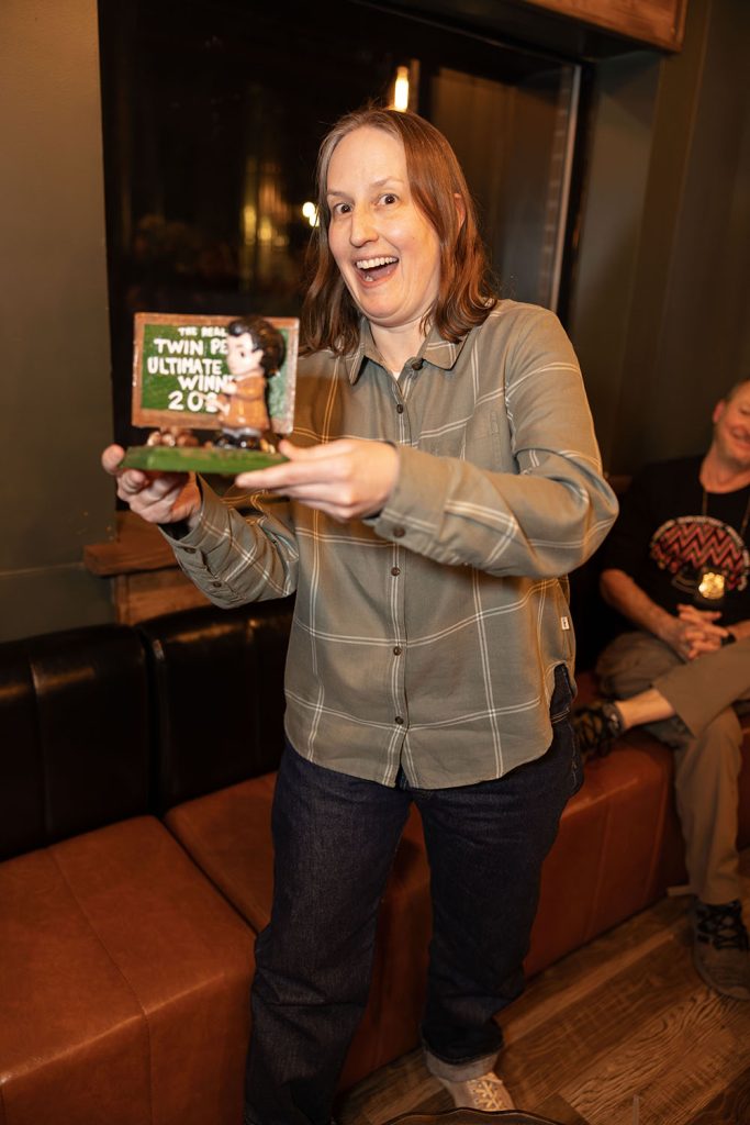 Nova with the ultimate trivia winner trophey