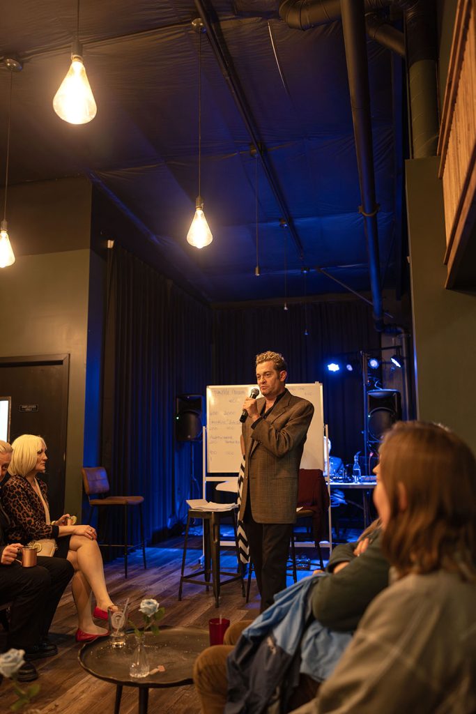 Josh Eisenstadt standing under the lights