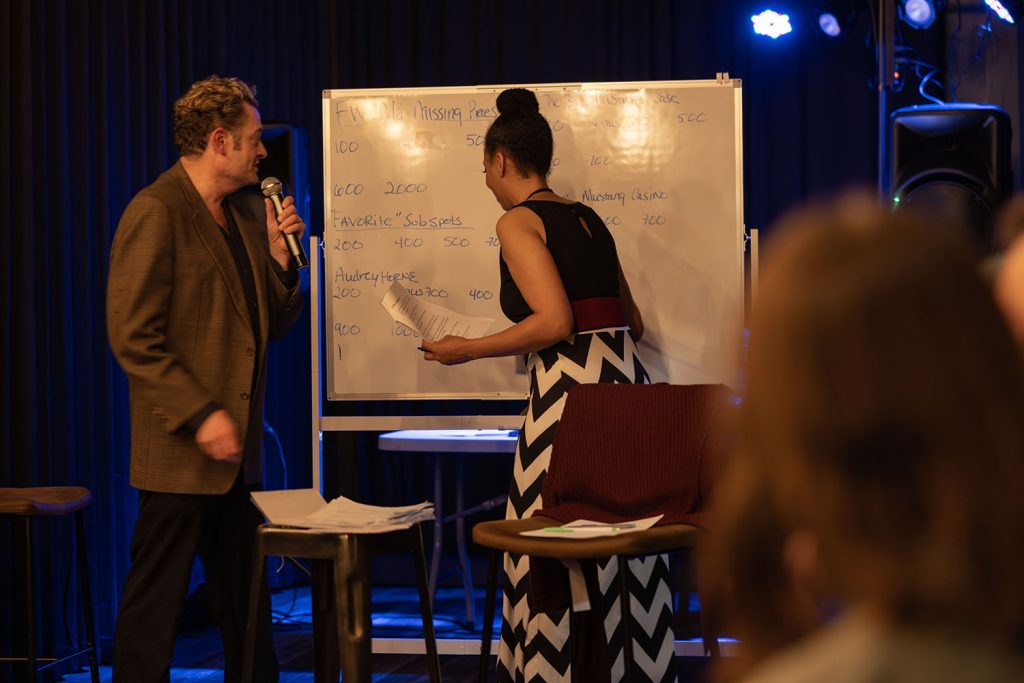 Charlene and Josh at the game board