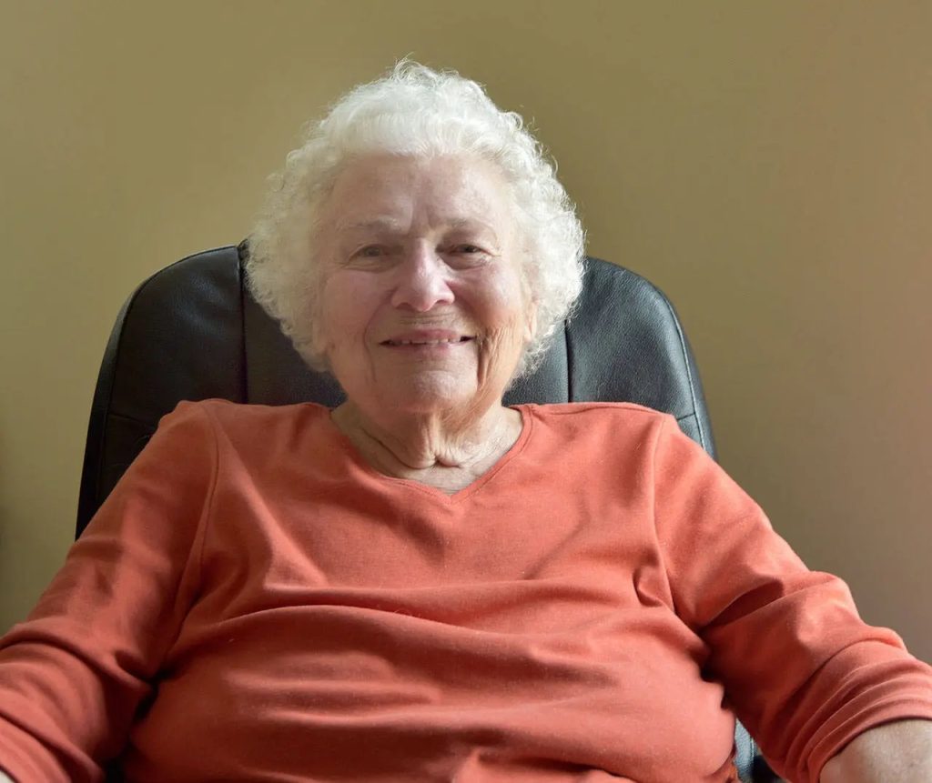 Pat Cokewell sitting in a chair