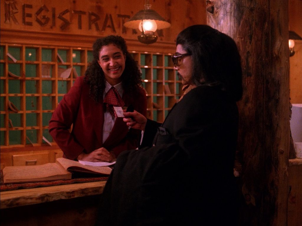 Louie and Mr. Tojamura at the Great Northern Hotel front desk