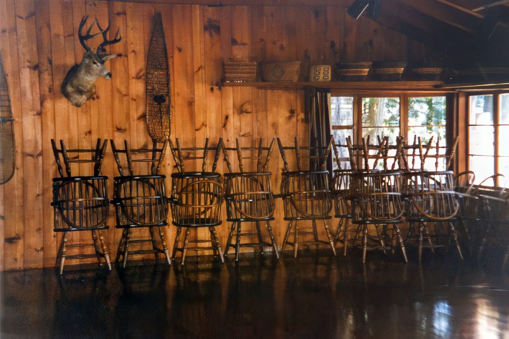 Dining room with stacked wooden chairs