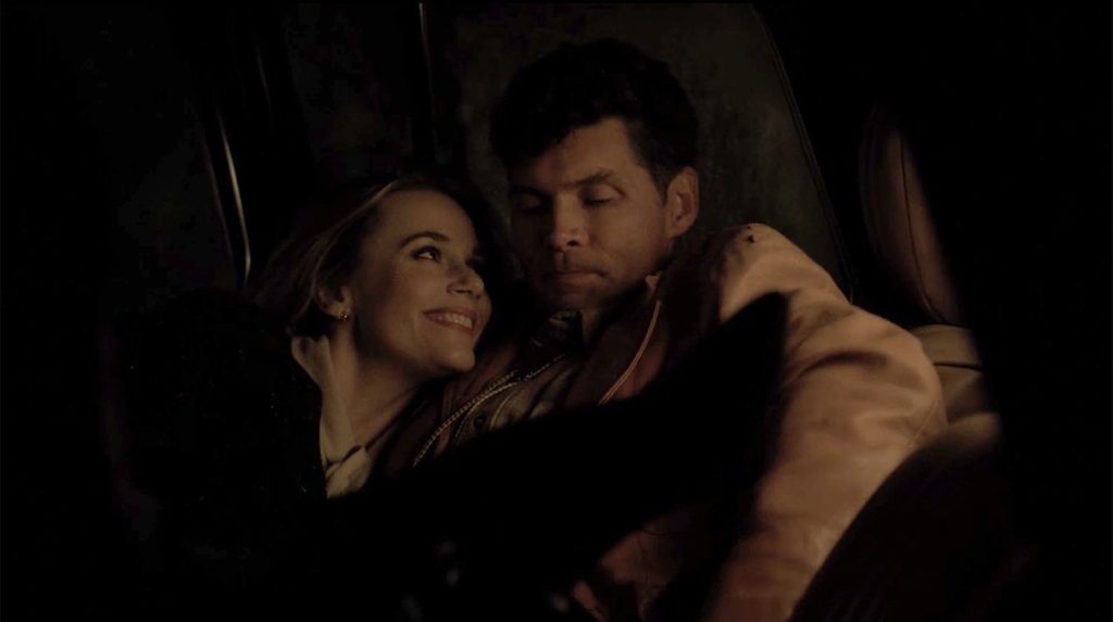 Ed and Norma inside his truck cabin