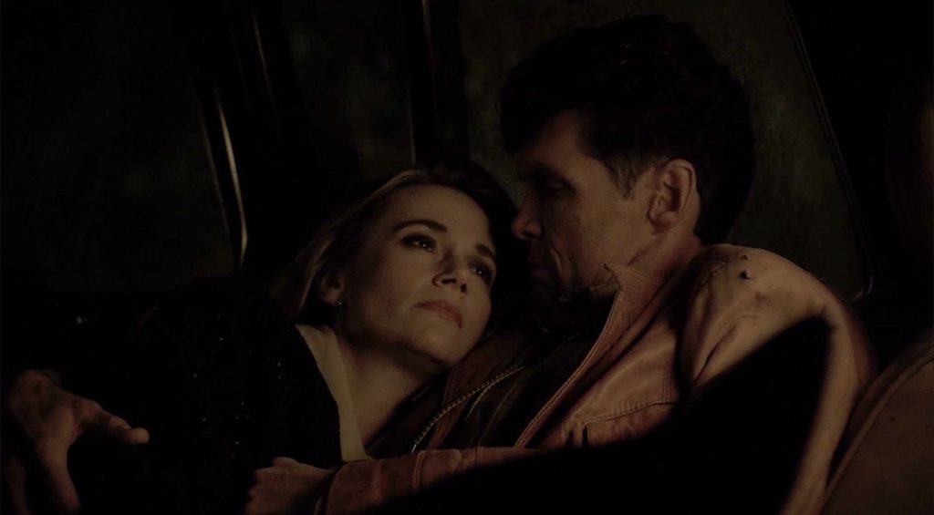 Norma and Ed sharing a moment in Ed's truck