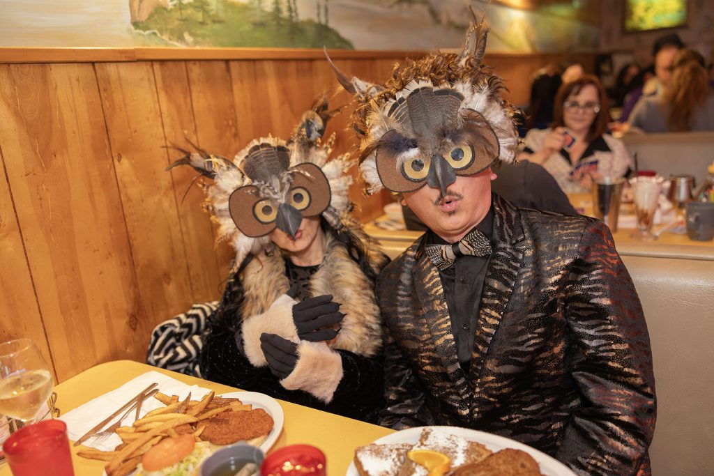 Two People dressed as owls