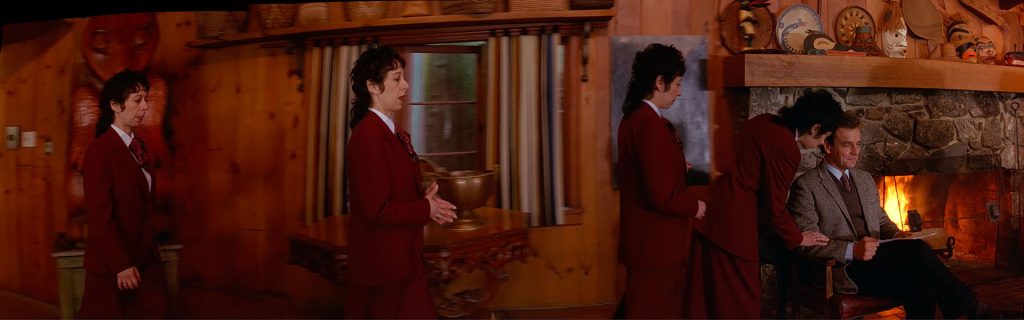 Julie Duvic (Diane Caldwell) walking across the room