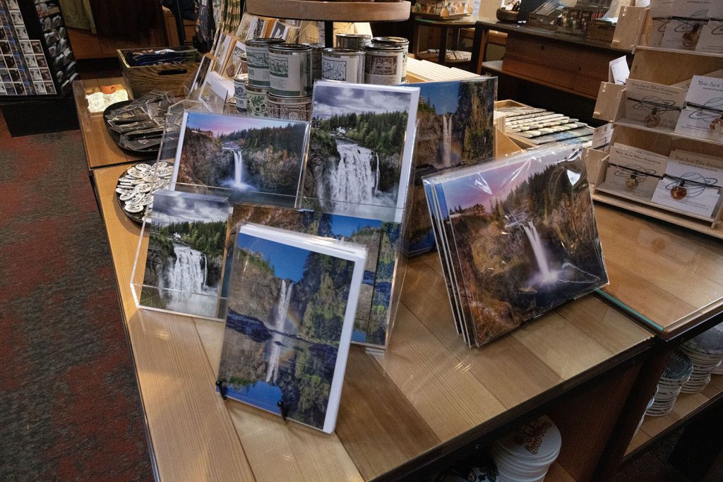 Postcards and artwork on display