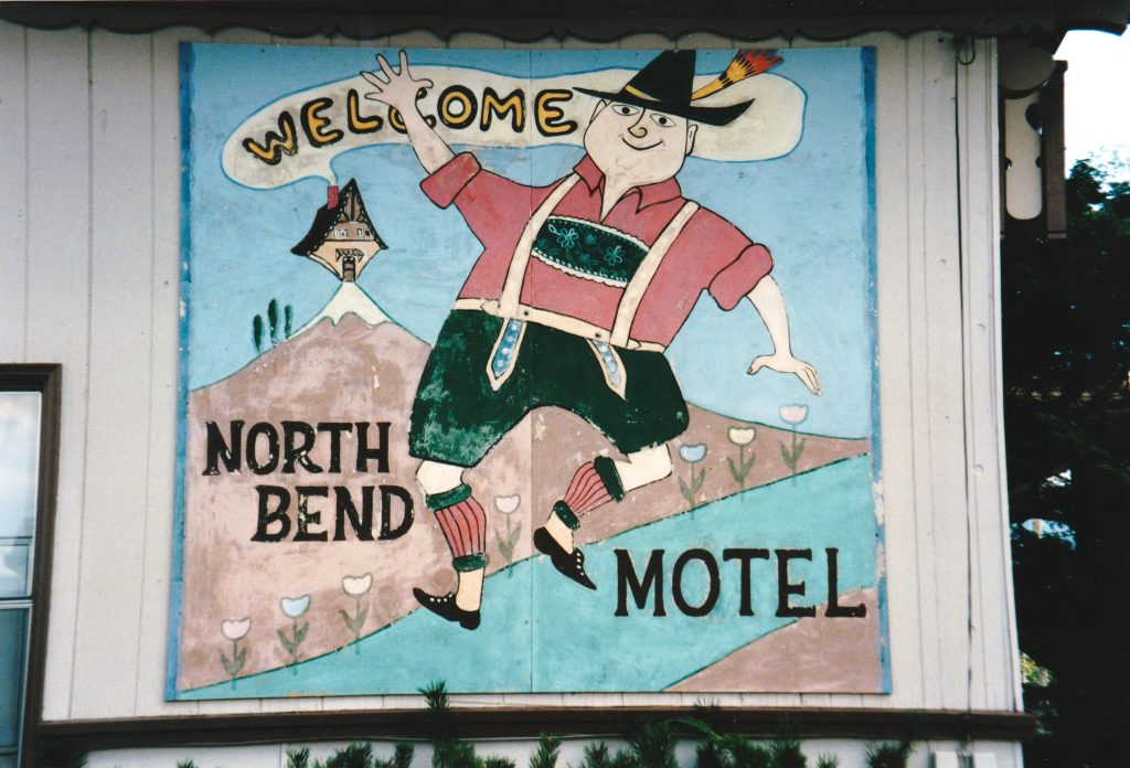 Alpine themed mural on side of North Bend Motel