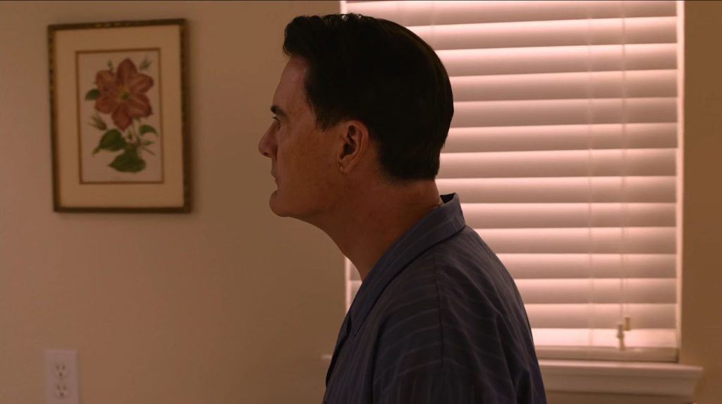 Dougie Jones looking at himself in the mirror